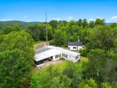 Chute-St-Philippe (Laurentides) : Fermette de 3,69 acres, maison de deux chambres, garage, serre.
